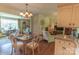 Charming dining room featuring chandelier lighting, hardwood floors, and a view to the formal living room at 3008 Imperial Dr, Gastonia, NC 28054