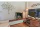 Charming living room fireplace with gas logs, brick surround, and decorative mantel at 3008 Imperial Dr, Gastonia, NC 28054