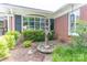 Charming front yard with a decorative water fountain and well-maintained landscaping adding to the home's curb appeal at 3008 Imperial Dr, Gastonia, NC 28054