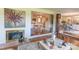 Inviting living room with fireplace, decorative rug, and seamless transition to adjacent kitchen and dining areas at 3008 Imperial Dr, Gastonia, NC 28054