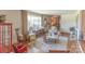 Bright and airy living room with a large window, hardwood floors, and comfortable seating arrangement at 3008 Imperial Dr, Gastonia, NC 28054