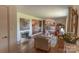 View of the living room, fireplace, and dining room at 3008 Imperial Dr, Gastonia, NC 28054