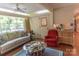 Comfortable living room with hardwood floors, a window offering a garden view, and traditional furnishings at 3008 Imperial Dr, Gastonia, NC 28054