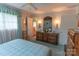 Comfortable main bedroom with ensuite access, plush carpeting, and a ceiling fan at 3008 Imperial Dr, Gastonia, NC 28054