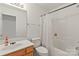Well-lit bathroom with a shower-tub combination and updated fixtures at 3129 Summerfield Ridge Ln, Matthews, NC 28105