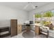 Bright home office space with a large window and desk area at 3129 Summerfield Ridge Ln, Matthews, NC 28105