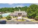 Aerial view of the community clubhouse, pool, and surrounding landscape at 330 Horton Grove Rd, Fort Mill, SC 29715