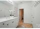 Bathroom with a white vanity, tiled floor, and a doorway to an adjacent room at 330 Horton Grove Rd, Fort Mill, SC 29715