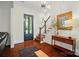 Bright foyer featuring hardwood floors, staircase, and stylish accents at 330 Horton Grove Rd, Fort Mill, SC 29715