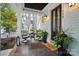 Cozy front porch with seating, potted plants, and stylish lighting for a welcoming entrance at 330 Horton Grove Rd, Fort Mill, SC 29715