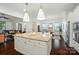 Spacious kitchen with granite countertops, stainless steel appliances, and views into the dining room at 330 Horton Grove Rd, Fort Mill, SC 29715