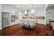 Open concept kitchen featuring an island with bar stool seating and pendant lighting at 330 Horton Grove Rd, Fort Mill, SC 29715