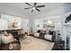 Spacious living room with a fireplace, comfortable seating, and an open floor plan at 330 Horton Grove Rd, Fort Mill, SC 29715