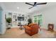Spacious living room with custom built-ins, and a comfortable chair at 330 Horton Grove Rd, Fort Mill, SC 29715