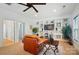 Spacious living room with custom built-ins, and a comfortable chair at 330 Horton Grove Rd, Fort Mill, SC 29715
