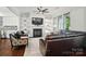 Elegant living room with a fireplace, built-in shelves, and comfortable seating at 330 Horton Grove Rd, Fort Mill, SC 29715
