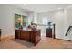 Bright office space featuring large desk and natural light from two windows at 330 Horton Grove Rd, Fort Mill, SC 29715