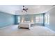 Spacious bedroom with tray ceilings, ceiling fan and neutral carpet at 3617 Ruth St, Indian Trail, NC 28079