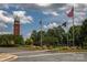 Charming town center featuring an iconic clock tower, flags, and a welcoming community atmosphere at 3617 Ruth St, Indian Trail, NC 28079