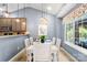 Inviting dining area with a view of the garden and stylish pendant lighting at 3820 Leela Palace Way, Fort Mill, SC 29708