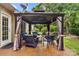 Relaxing outdoor gazebo with comfortable seating, perfect for entertaining or enjoying a peaceful retreat at 3820 Leela Palace Way, Fort Mill, SC 29708