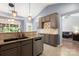 Modern kitchen features granite countertops, stainless steel appliances, and stylish cabinetry at 3820 Leela Palace Way, Fort Mill, SC 29708