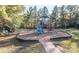 Community playground with a slide, swings, and ample space for children to play at 3820 Leela Palace Way, Fort Mill, SC 29708