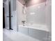 Bathroom with white tile, and a bathtub at 404 Kings Dr # 7, Cherryville, NC 28021