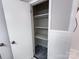 Bathroom linen closet featuring organized shelving, providing ample storage space and convenience at 404 Kings Dr # 7, Cherryville, NC 28021