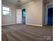 Spacious bedroom showcasing neutral walls, plush carpet, with ample natural light and a connecting bathroom at 404 Kings Dr # 7, Cherryville, NC 28021