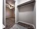 Walk-in closet with plush carpet and a convenient closet rod, offering ample storage solutions at 404 Kings Dr # 7, Cherryville, NC 28021