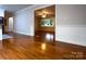 Bright and open living area with hardwood floors, offering a seamless flow into other spaces at 404 Kings Dr # 7, Cherryville, NC 28021