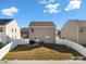 Fenced backyard with a patio and ample green space, perfect for outdoor activities and relaxation at 446 Misty Law Ln, Clover, SC 29710