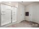 Bathroom featuring large glass shower, tile floor and neutral decor at 446 Misty Law Ln, Clover, SC 29710