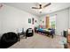 Bright bedroom with a ceiling fan, a twin sized bed and playful decorations at 446 Misty Law Ln, Clover, SC 29710