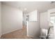 Upstairs hallway with carpeted floors, doors to bedrooms, and staircase at 446 Misty Law Ln, Clover, SC 29710