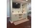 Finished basement area with built-in cabinets and shelving for entertainment at 517 Grassy Creek Run, Chester, SC 29706
