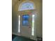 Elegant front door with ornate glass details and sidelights at 517 Grassy Creek Run, Chester, SC 29706