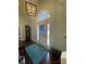 Bright front foyer with decorative door, statement lighting, and wood floors at 517 Grassy Creek Run, Chester, SC 29706