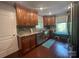 Well-lit kitchen featuring wood cabinets, stainless steel appliances, granite countertops, and hardwood floors at 517 Grassy Creek Run, Chester, SC 29706