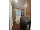 Laundry room features washer, dryer, gray walls, and door to exterior at 517 Grassy Creek Run, Chester, SC 29706