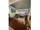 Comfortable living room featuring a tray ceiling, hardwood floors, and neutral decor at 517 Grassy Creek Run, Chester, SC 29706