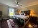 Charming primary bedroom with natural light, a decorative bed, and bedside tables at 517 Grassy Creek Run, Chester, SC 29706