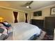 Bedroom with TV, ceiling fan, and decorative bedspread at 517 Grassy Creek Run, Chester, SC 29706