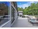 Spacious back deck that is ideal for relaxing or entertaining, grill, and an outdoor kitchen at 5262 Mckenzie Trl, Conover, NC 28613