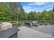 Expansive back deck provides ample space for grilling, dining, and enjoying outdoor living with forest backdrop at 5262 Mckenzie Trl, Conover, NC 28613