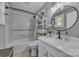 Updated bathroom with a shower-tub combination, modern vanity, and stylish fixtures at 5262 Mckenzie Trl, Conover, NC 28613