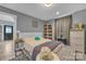 Comfortable bedroom with a cozy bed, neutral walls, and stylish decor at 5262 Mckenzie Trl, Conover, NC 28613