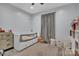 Bedroom with a small bed, wood flooring, and plenty of storage space at 5262 Mckenzie Trl, Conover, NC 28613