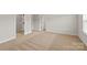 Spacious bedroom with a walk-in closet at 5607 Skinny Dr, Charlotte, NC 28215